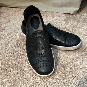 Earth black laser cut leather flats, size 8.5, like new.